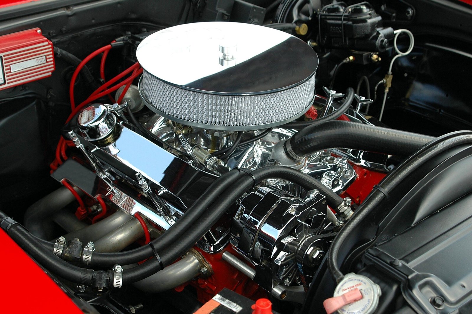 Mechanic performing an engine tune-up in Fort Worth, TX